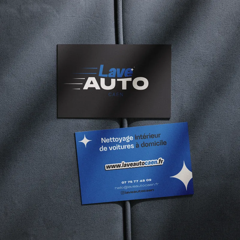 Cartes de visite Lave Auto, noire et bleue, sur un tissu gris foncé